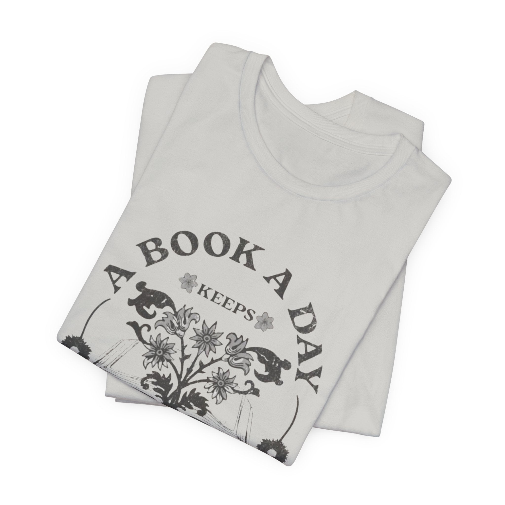 A Book A Day Keeps Reality Away T-Shirt | Reading Floral Illustration