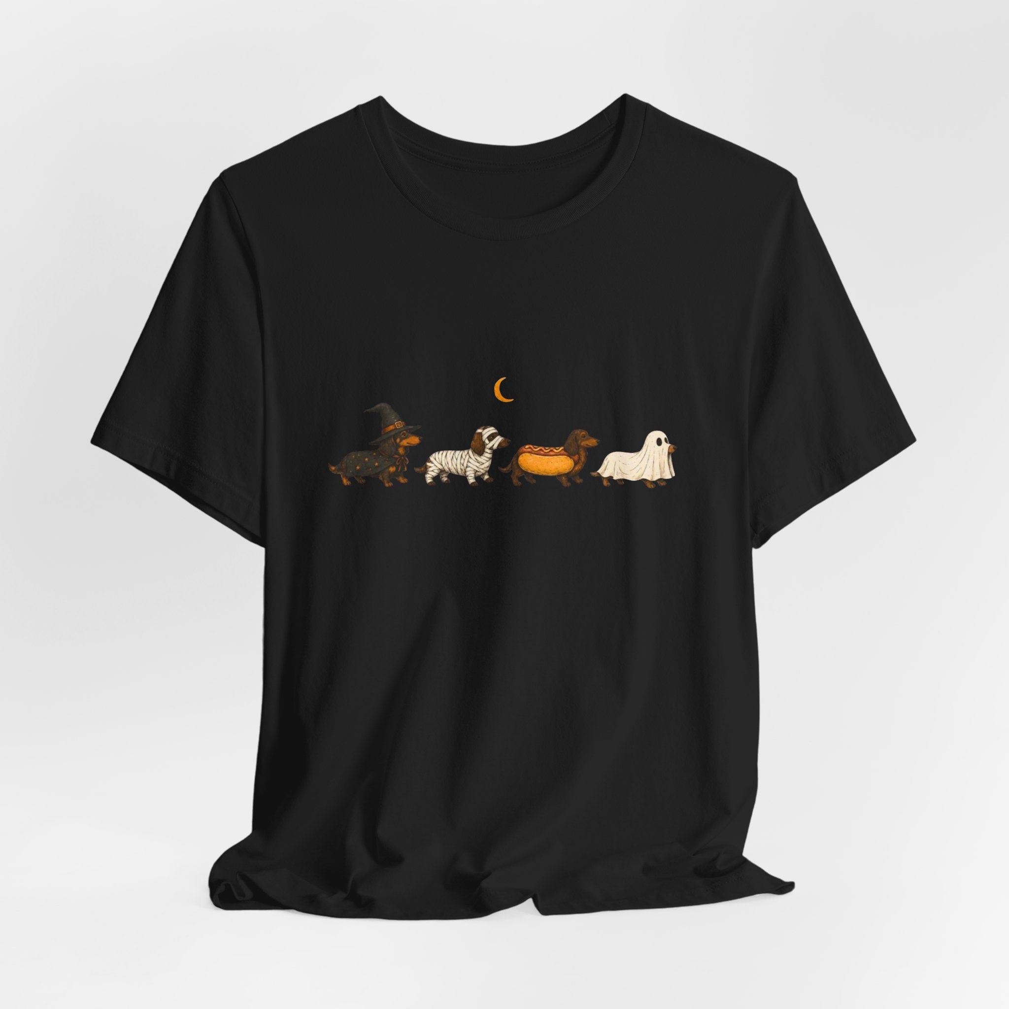 Dachshund Halloween Parade T‑Shirt — Witch, Crescent Moon & Cute Sausage Dog Lineup