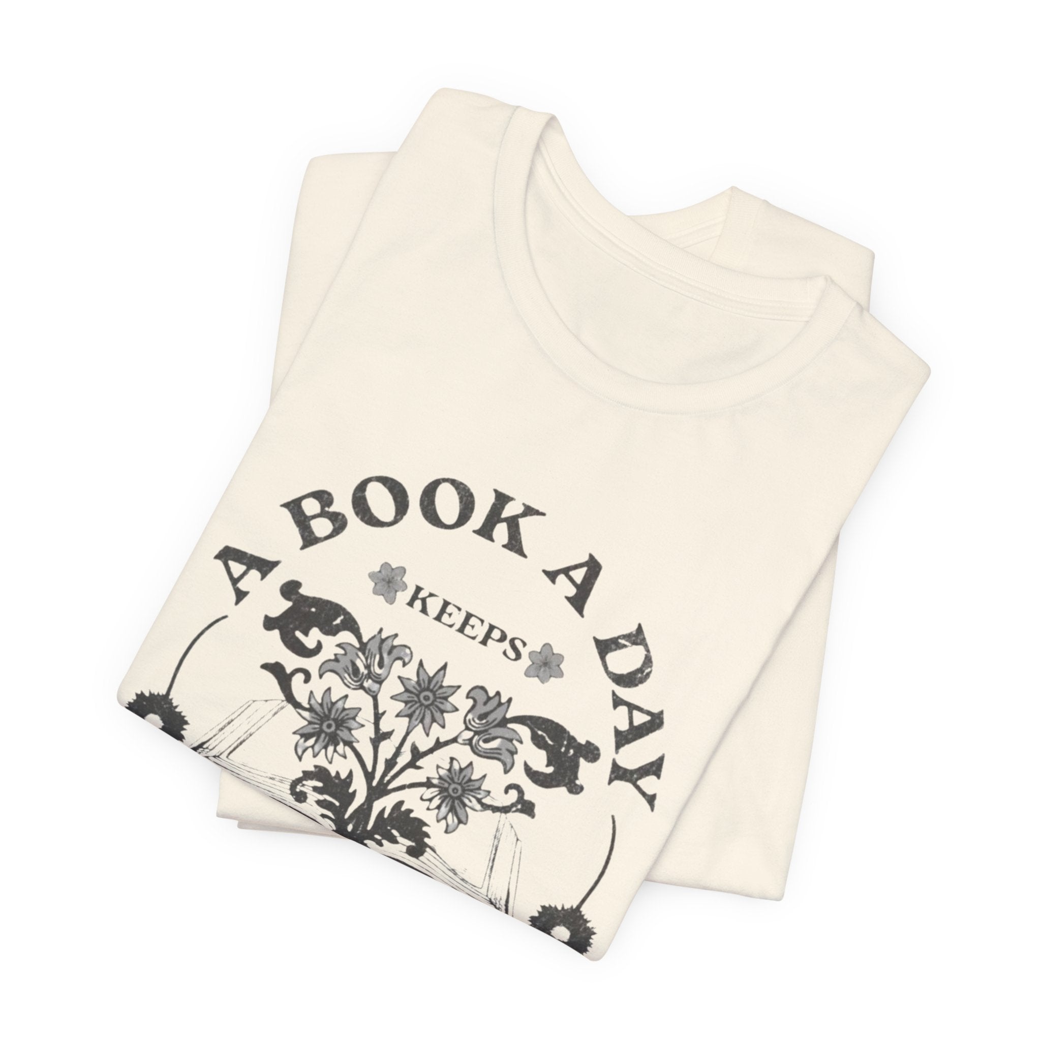 A Book A Day Keeps Reality Away T-Shirt | Reading Floral Illustration