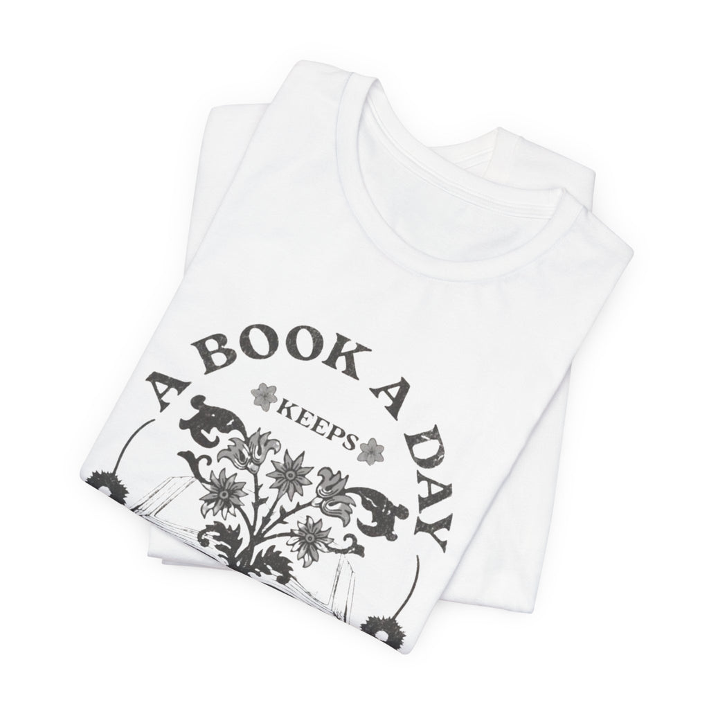 A Book A Day Keeps Reality Away T-Shirt | Reading Floral Illustration