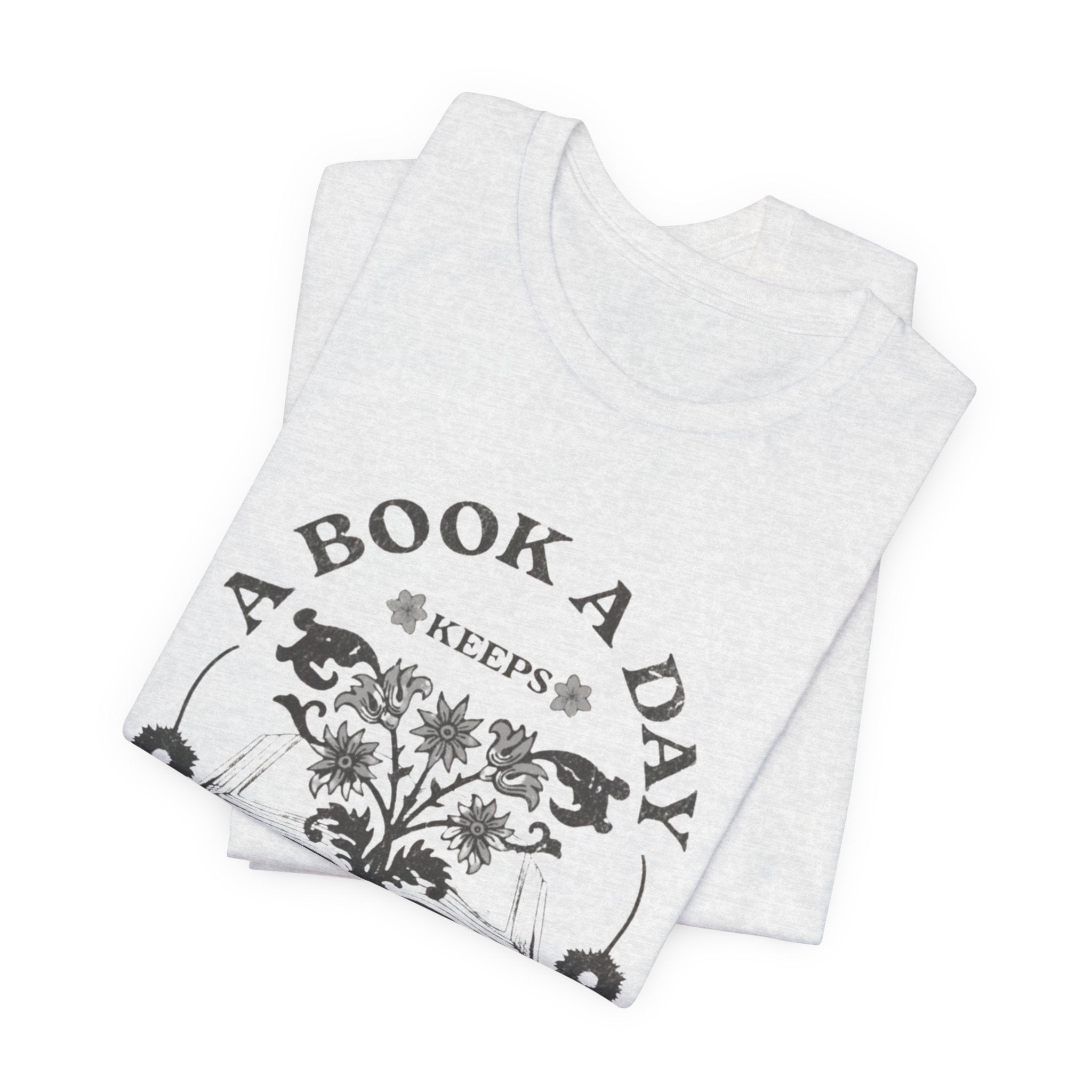A Book A Day Keeps Reality Away T-Shirt | Reading Floral Illustration